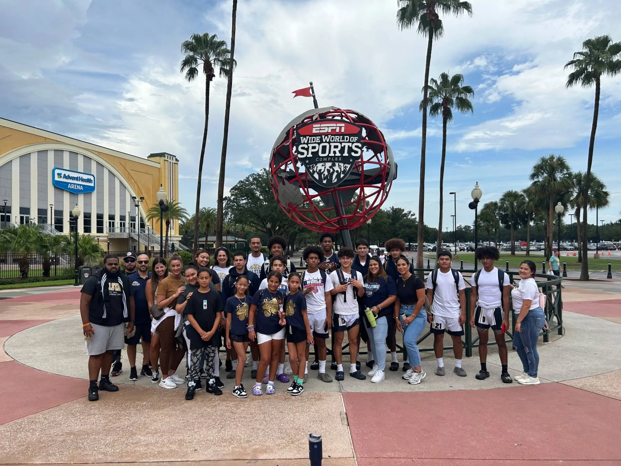 Ballstars players, families and coaches together in front of the Wide World of Sports globe
