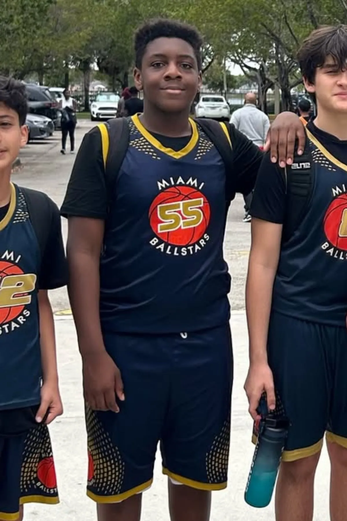 Three Ballstars players in their navy Miami Ballstars jerseys